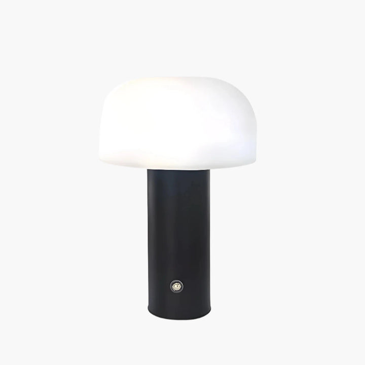 Modern table lamp with a black cylindrical base and white dome-shaped shade.