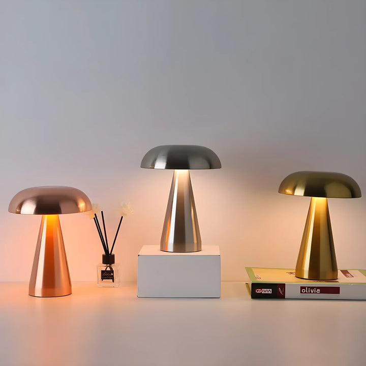 Mushroom-shaped table lamps in metallic finishes.