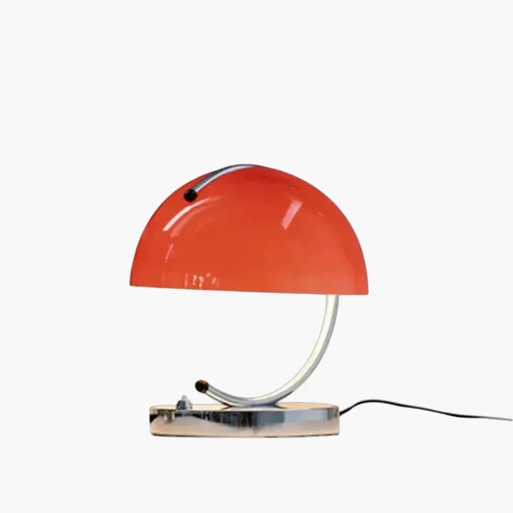 Red dome-shaped table lamp with a curved metal base.