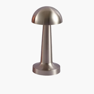 Metallic mushroom-shaped table lamp with a domed top and cylindrical base.